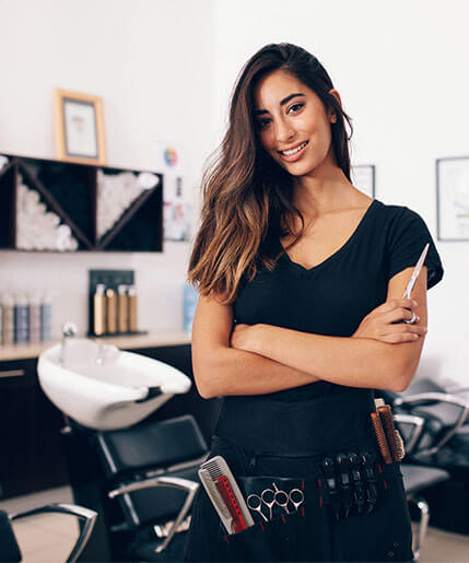 Hair stylist standing in a beauty salon